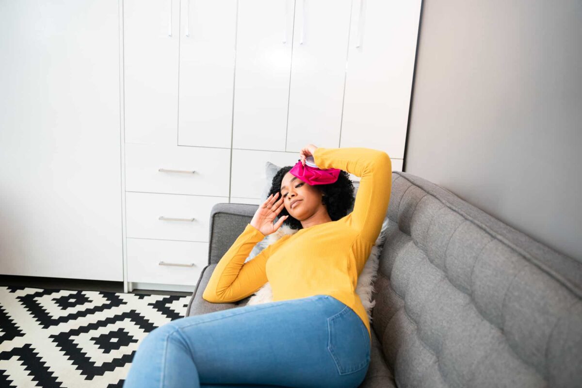 woman using an ice pack couch