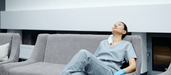 woman resting sofa